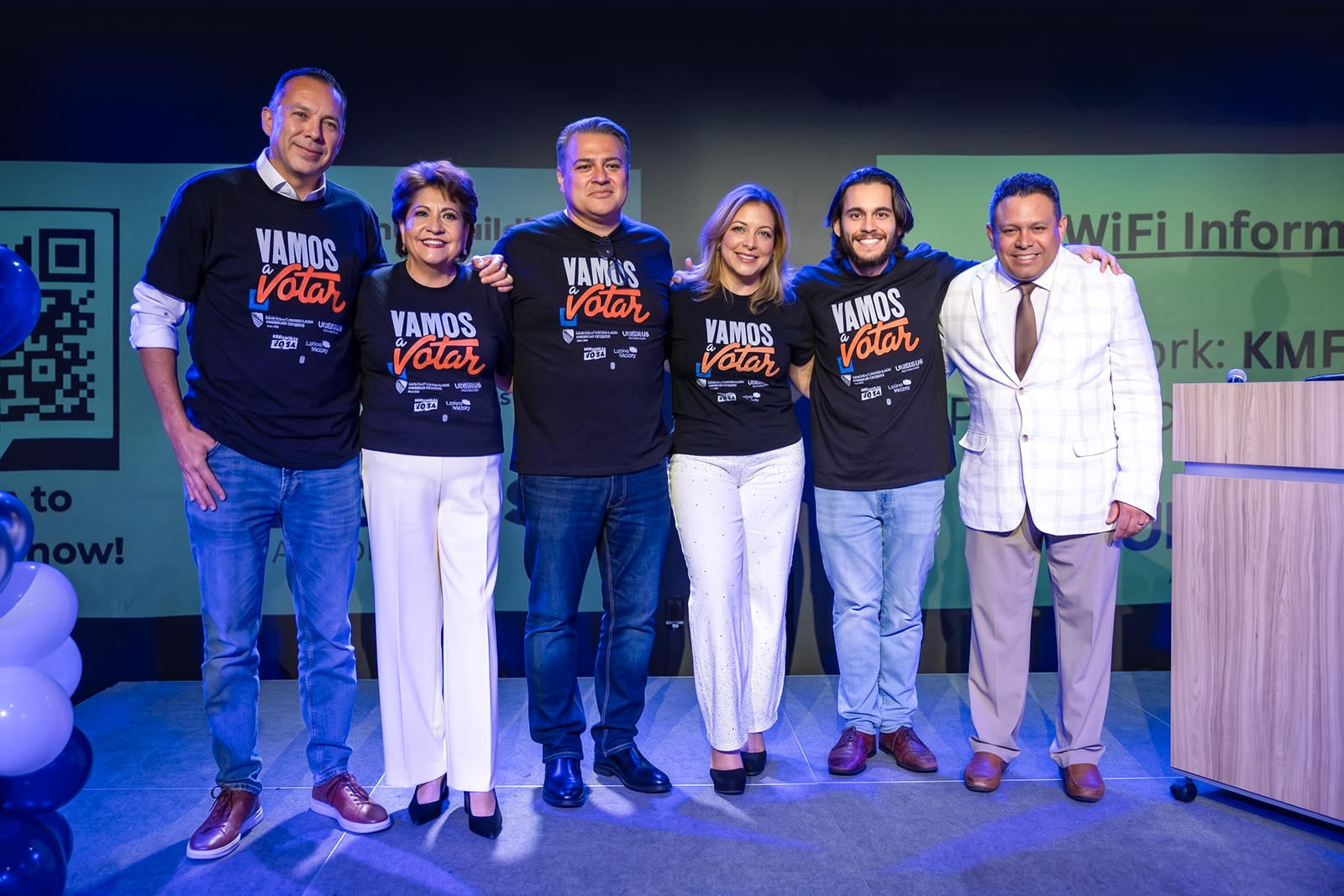 Leaders of the four coalition organizations in Vamos a Votar shirts at a LULAC event